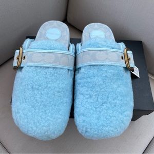 New coach shearling clogs.